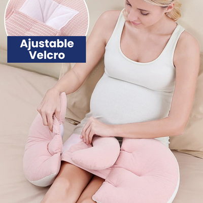 Pregnant woman using a pink Adjustable Pregnancy Support Pillow with adjustable Velcro straps for comfort