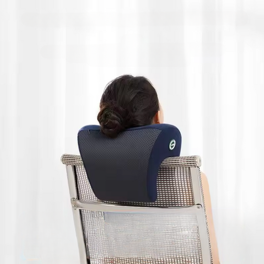 Person using navy blue Neck Pillow For Chair on a mesh office chair for neck support